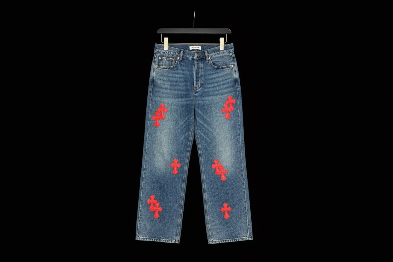 Chrome Hearts Gallery Dept Levis jeans with blue and red crossed patches.